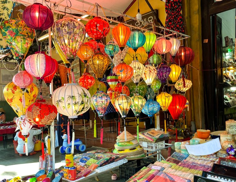 Bright coloured lanterns light up the entrance to a souvenir store at Hoi An Central Market