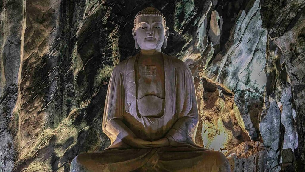 Sitting Buddha in the Am Phu Cave, Marble Mountains